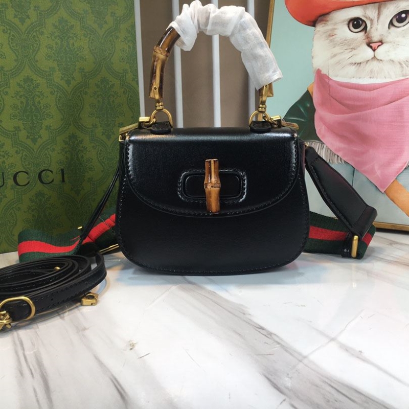 G*u*i top handle bags